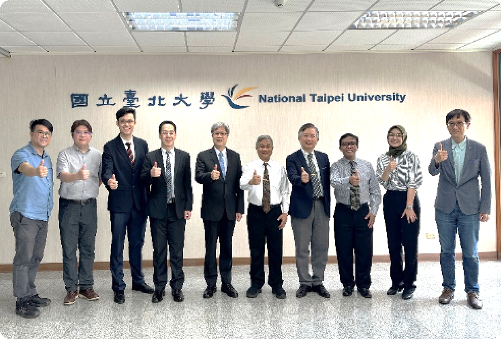 圖 2：國立臺北大學長官與 UAI 團隊合影